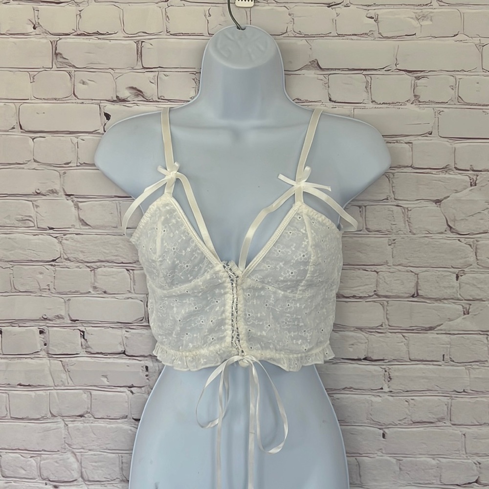 Pretty little thing  white broderie lace up cut out crop top size small